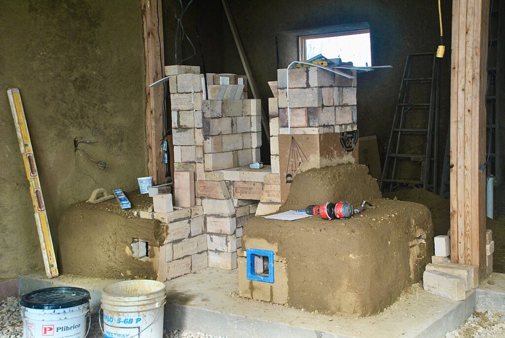 Masonry heater workshop available in the Ozarks. Cob, earthen plaster, rocket mass heater, off grid